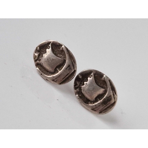 86 - A pair of silver IONA style ear studs