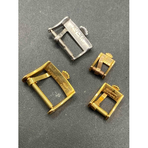 880 - Three rolled gold and one stainless steel ROLEX watch buckles