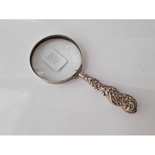 915 - A silver handled magnifying glass, 5