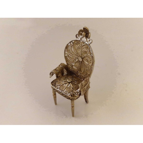 941 - Prayer book embossed with an angels head. London 1904 By W C and a miniature filigree chair.