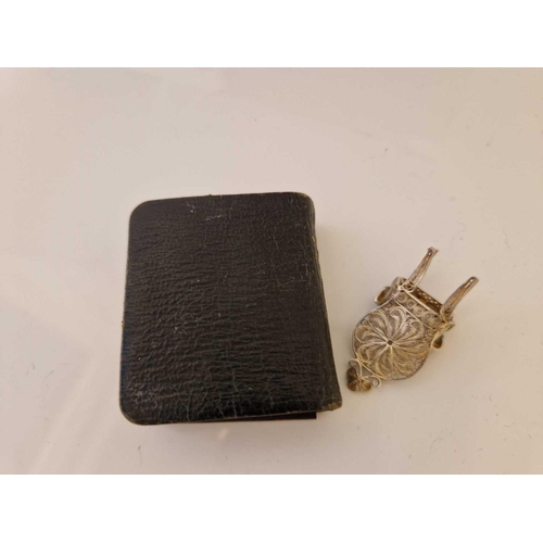 941 - Prayer book embossed with an angels head. London 1904 By W C and a miniature filigree chair.