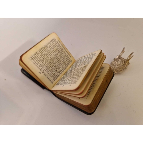 941 - Prayer book embossed with an angels head. London 1904 By W C and a miniature filigree chair.