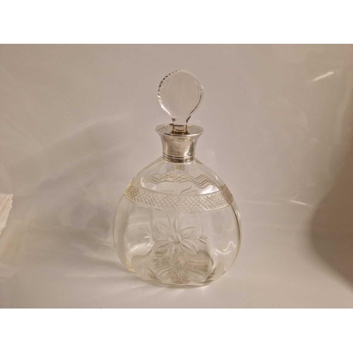 947 - Cut glass decanter and stopper with silver neck. 9.5 in high. Birmingham 1910