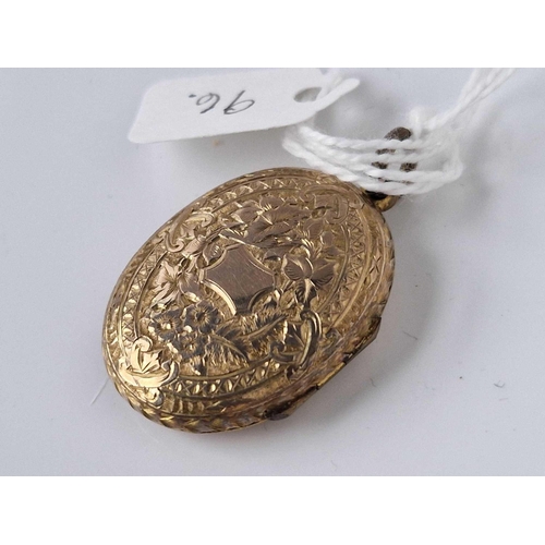 96 - A fancy Victorian oval gold back and front locket 4.9 gms