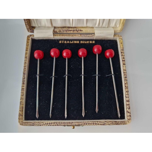 968 - Boxed set of sterling silver cocktail sticks with cherry ends