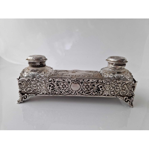 981 - Victorian two bottle inkstand with stamped compartment to centre on four masked legs. 8 in wide. Lon... 