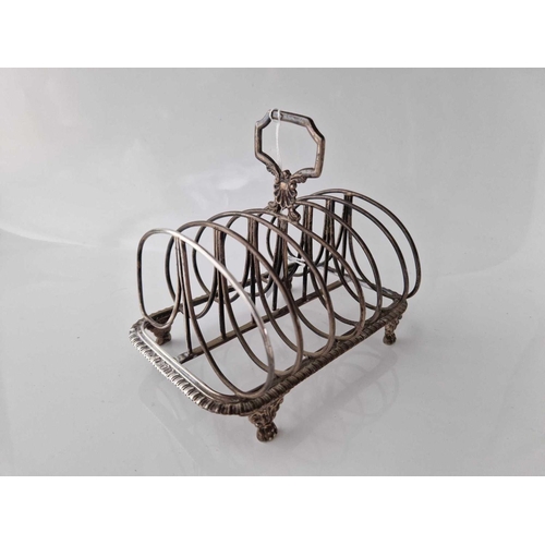 983 - Good heavy Georgian style toast rack with seven wire divisions. 7 in long. London 1896 By D W 371gms