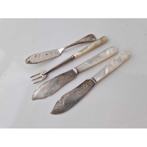 989 - Pair of butter knives with M O P handles. Sheffield 1896, a pickle fork and a butter knife