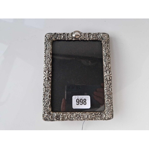 998 - A rectangular photo frame with embossed boarder, 6.5