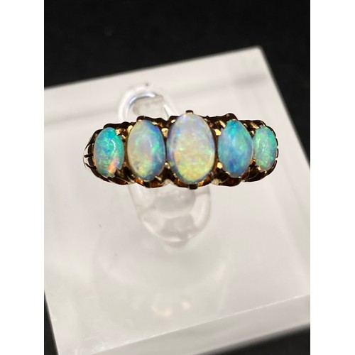 52 - A GOOD COLOUR FIVE STONE OPAL RING 18CT GOLD SIZE N 4.3 GMS