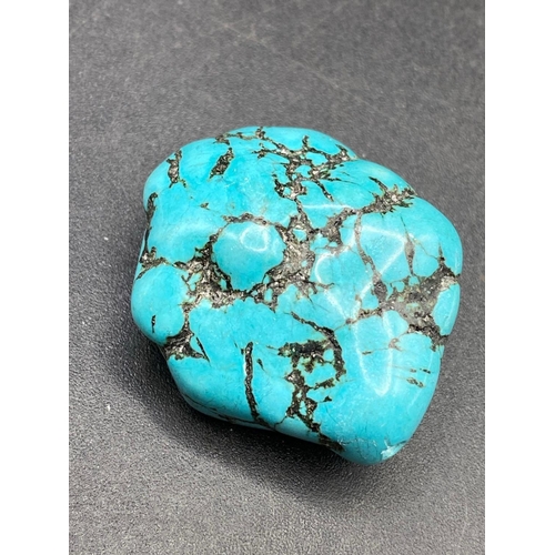 113 - A very large fine turquoise matrix polished gem stone 225 carats