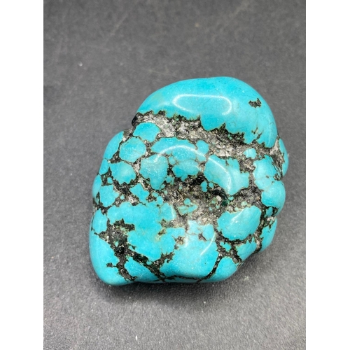 113 - A very large fine turquoise matrix polished gem stone 225 carats