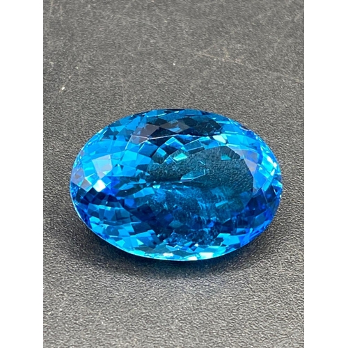 120 - A fine Brazilian intense blue topaz gem stone 29.5 X 20.6 X 13.6 65 carats