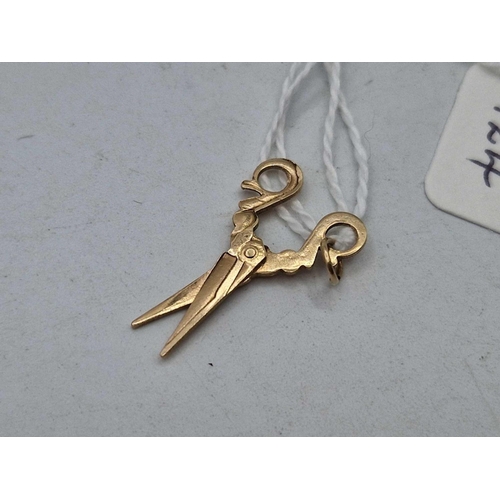 124 - A articulated gold scissors charm