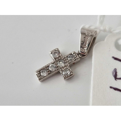 137 - A white gold and diamond cross pendant, 14ct, 1 g