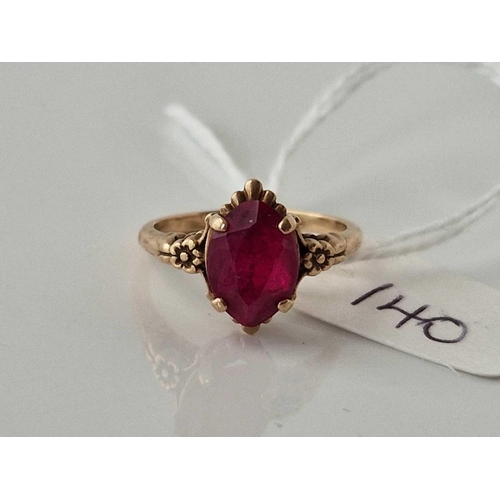 140 - A red stone ring, 9ct, size K, 2.5 g.