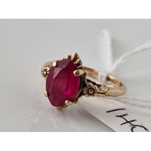 140 - A red stone ring, 9ct, size K, 2.5 g.