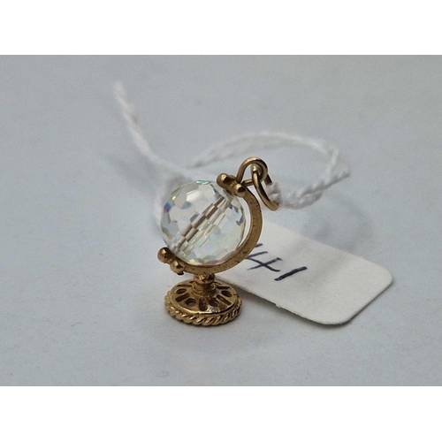 141 - A globe charm with spinning crystal 9ct