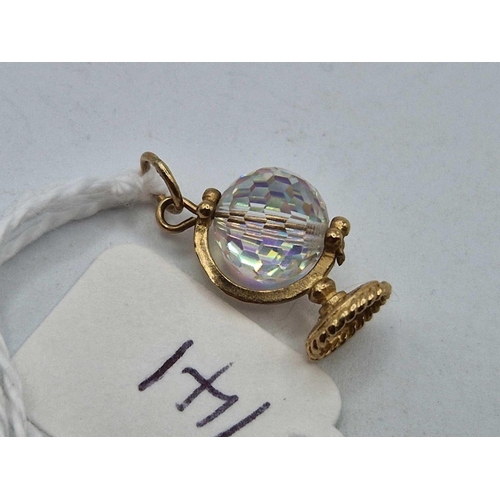 141 - A globe charm with spinning crystal 9ct