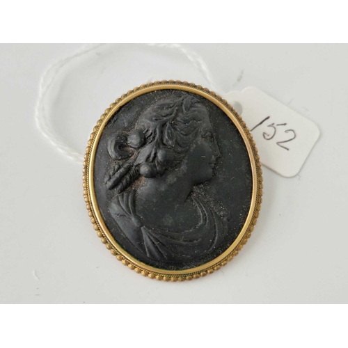 152 - A black lava cameo mounted in gold