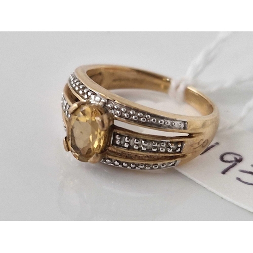 193 - A citrine and diamond three row ring, 9ct, size L, 3.7 g.