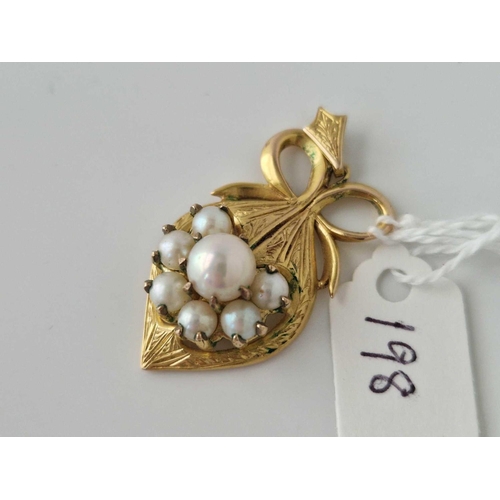 198 - A pearl and gold ribbon topped pendant, 9ct, 7.4 g.