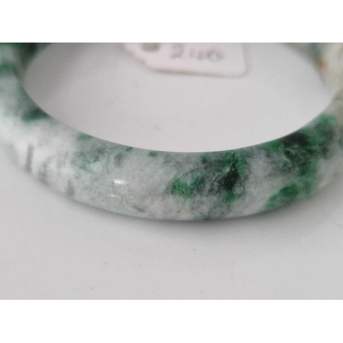 240 - A antique apple jade coloured bangle