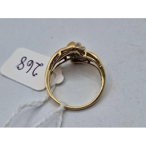 268 - A diamond twist ring, 14ct, size Q, 4.6 g.