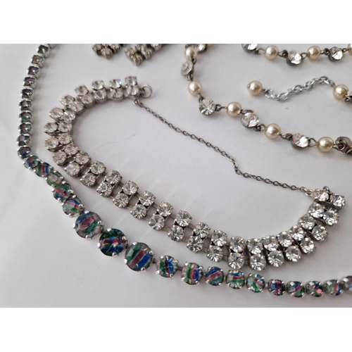 273 - A bag of diamant� jewellery including bracket earrings etc.