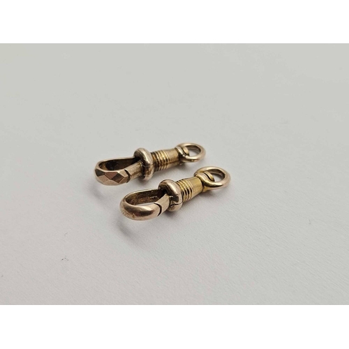 278 - Two antique gold dog clips