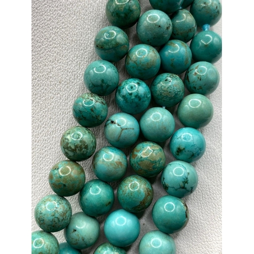 291 - A rare vintage turquoise matrix necklace 8mm beads 910 carats 76 inch