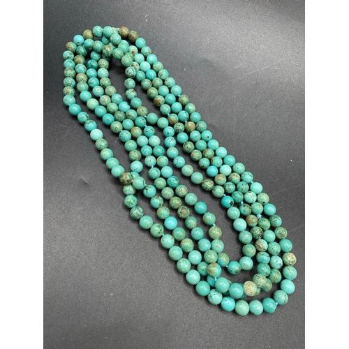 291 - A rare vintage turquoise matrix necklace 8mm beads 910 carats 76 inch