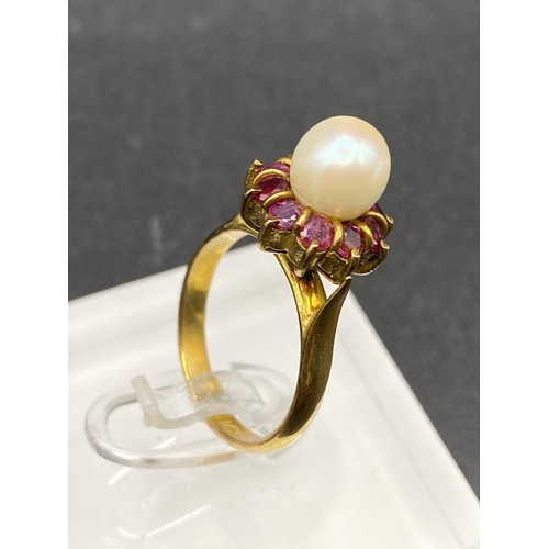 300 - A ruby and pearl cluster ring 14ct gold size L 4.3 gms