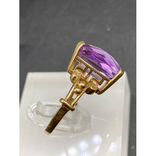 315 - A amethyst ornate shoulder ring 9ct size N 5 gms