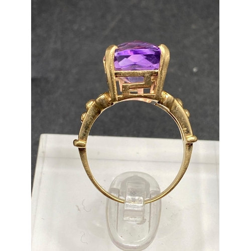 315 - A amethyst ornate shoulder ring 9ct size N 5 gms