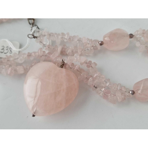 338 - A rose quartz heart pendant necklace with silver clasp boxed 18 inch