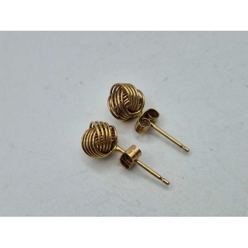 346 - A pair of fancy knot ear studs 9ct