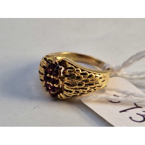 373 - A child�s ruby and diamond ring, 18ct, 4.2 g.