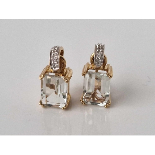 387 - A pair of topaz and diamond drop earrings, 9ct, 2.3 g.