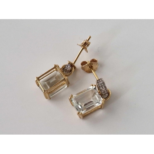 387 - A pair of topaz and diamond drop earrings, 9ct, 2.3 g.