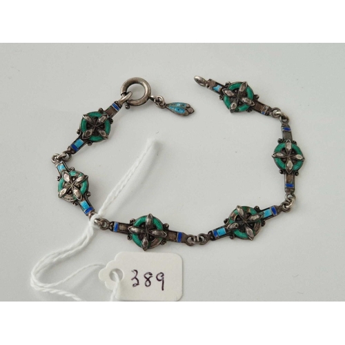 389 - A stylish silver and enamel bracelet