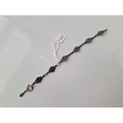 389 - A stylish silver and enamel bracelet