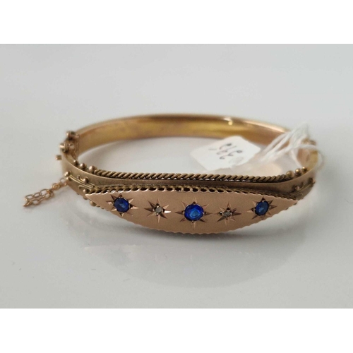 395 - A ANTIQUE SAPPHIRE AND DIAMOND HINGED BANGLE, 9ct, 10.3 g.