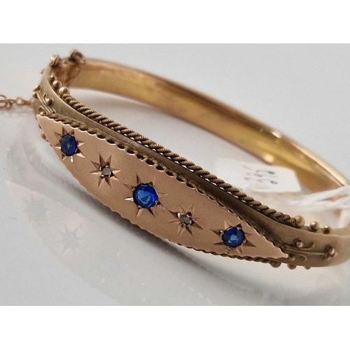 395 - A ANTIQUE SAPPHIRE AND DIAMOND HINGED BANGLE, 9ct, 10.3 g.