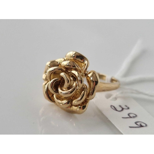 399 - A rose design ring, 9ct, size R, 4.9 g.