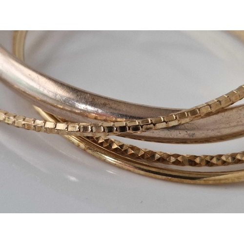 400 - Four silver gilt bangles, 27 g