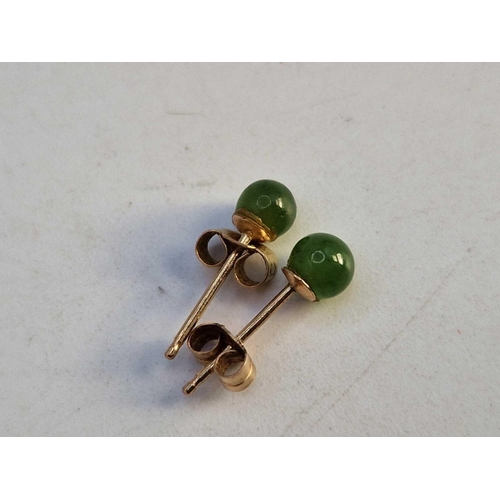 453 - A pair of 9ct gold jade studs