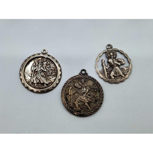 465 - Three silver St Christopher pendants