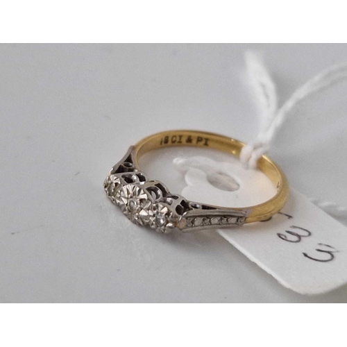 533 - A three stone diamond ring 18ct gold size K 2.1 gms