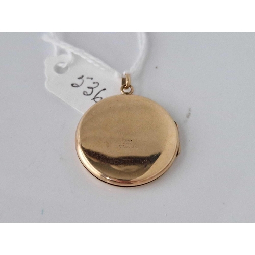 536 - A circular locket 9ct 4.7 gms